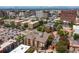 Overhead aerial view of brick apartment building in urban setting at 1100 N Grant St # 208, Denver, CO 80203
