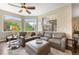 Spacious living room features a large window with beautiful views and comfortable seating at 1100 N Grant St # 208, Denver, CO 80203