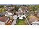 Bird's eye view of the neighborhood, showing the backyard, privacy fence, and surrounding homes at 134 N 6Th Ave, Brighton, CO 80601