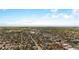 Wide aerial shot showcasing the property's neighborhood and community feel with tree-lined streets at 134 N 6Th Ave, Brighton, CO 80601