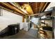 Unfinished basement featuring mechanicals, freezers, shelving and storage at 134 N 6Th Ave, Brighton, CO 80601