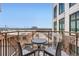 Outdoor balcony with comfortable seating and neighborhood views at 3100 Huron St # 3E, Denver, CO 80202