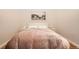 Inviting bedroom features modern decor and soft, ambient lighting at 3100 Huron St # 3E, Denver, CO 80202