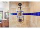 Close-up of a shower, featuring designer tile accents, a rainfall shower head, and stylish fixtures at 29477 Blue Moon Dr, Evergreen, CO 80439