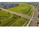 Overhead view of neighborhood street with parks, greenbelts, trails and open space at 10295 E 59Th Ave, Denver, CO 80238