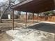 Covered patio overlooking the spacious backyard, perfect for outdoor entertaining and relaxation at 2521 Billings St, Aurora, CO 80011
