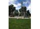 Well-maintained playground with various play structures and a park bench for relaxing at 2521 Billings St, Aurora, CO 80011
