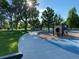 Community playground featuring a walking path and play equipment at 2521 Billings St, Aurora, CO 80011