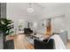 Bright living room with vaulted ceilings, hardwood floors, and an open layout at 12671 E Bates Cir, Aurora, CO 80014