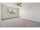 Bright bedroom with a window and neutral wall colors at 715 S Alton Way # 5A, Denver, CO 80247