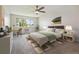Spacious bedroom with a large window and neutral decor at 715 S Alton Way # 5A, Denver, CO 80247
