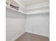 Walk-in closet with double hanging rods and shelving at 715 S Alton Way # 5A, Denver, CO 80247