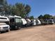 Parking lot with multiple spaces for RVs at 715 S Alton Way # 5A, Denver, CO 80247