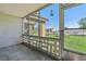 Screened porch with sliding glass door access to yard at 715 S Alton Way # 5A, Denver, CO 80247