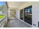 Private screened porch with view of the backyard at 715 S Alton Way # 5A, Denver, CO 80247