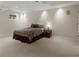 Finished basement bedroom with neutral carpet and decor, and recessed lighting at 8953 W Brandt Pl, Littleton, CO 80123