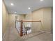 View of the second story hallway with staircase overlooking the living room area at 8953 W Brandt Pl, Littleton, CO 80123
