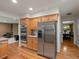 This modern kitchen showcases stainless steel refrigerator, double ovens and plenty of cabinet storage at 8953 W Brandt Pl, Littleton, CO 80123