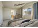 Main bedroom with ensuite bathroom and hillside views at 3008 Mountain Sky Dr, Castle Rock, CO 80104