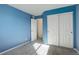 Bedroom with double door closet and grey carpet at 3008 Mountain Sky Dr, Castle Rock, CO 80104