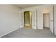 Bedroom with double doors to hallway and closet at 3008 Mountain Sky Dr, Castle Rock, CO 80104