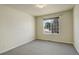 Bedroom with window and grey carpet at 3008 Mountain Sky Dr, Castle Rock, CO 80104