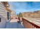 Deck with mountain views and a partially visible hot tub at 3008 Mountain Sky Dr, Castle Rock, CO 80104