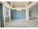 Bright dining room with a large window and neutral decor at 3008 Mountain Sky Dr, Castle Rock, CO 80104