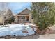 House exterior showcasing stone and siding accents and a covered porch at 3008 Mountain Sky Dr, Castle Rock, CO 80104