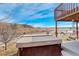 Hot tub on a deck with a view of the mountain landscape at 3008 Mountain Sky Dr, Castle Rock, CO 80104