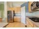 Modern kitchen features stainless steel appliances and light wood cabinets at 3008 Mountain Sky Dr, Castle Rock, CO 80104