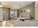 Bright living room with vaulted ceiling, neutral color palette, and comfy seating at 3008 Mountain Sky Dr, Castle Rock, CO 80104