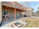 Backyard patio with fire pit and hot tub, offering a relaxing outdoor space at 3008 Mountain Sky Dr, Castle Rock, CO 80104