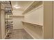 Large walk-in closet with shelving and drawers at 3008 Mountain Sky Dr, Castle Rock, CO 80104