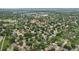 Overhead shot of a quiet neighborhood featuring lush greenery and varied home styles at 6514 Zinnia St, Arvada, CO 80004