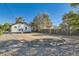 Backyard view of a house featuring a gravel area bordered by rocks at 101 S 11 Ave, Brighton, CO 80601