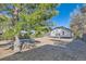 Backyard view of a house featuring a gravel area bordered by rocks at 101 S 11 Ave, Brighton, CO 80601