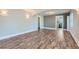 Spacious living room featuring wood floors, archways and decorative lighting at 101 S 11 Ave, Brighton, CO 80601