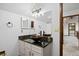 Contemporary bathroom with vessel sink, granite counters, and updated lighting at 5735 Big Canon Dr, Greenwood Village, CO 80111