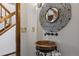 Stylish powder room featuring a copper sink and decorative mirror at 5735 Big Canon Dr, Greenwood Village, CO 80111