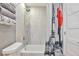 Bathroom with tub shower and Eiffel Tower shower curtain at 9195 E Lehigh Ave # 151, Denver, CO 80237