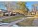 Landscaped community with sidewalks and mature trees at 9195 E Lehigh Ave # 151, Denver, CO 80237