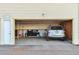 Attached garage with space for one car and storage at 9195 E Lehigh Ave # 151, Denver, CO 80237