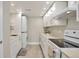 Modern kitchen with white cabinets and stainless steel appliances at 9195 E Lehigh Ave # 151, Denver, CO 80237