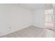 Bedroom featuring tile flooring and mirrored closet doors at 372 Vance St, Lakewood, CO 80226
