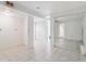 Bedroom featuring tile flooring and mirrored closet doors at 372 Vance St, Lakewood, CO 80226
