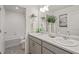 Clean bathroom with double vanity and a tub shower combo at 3319 Belleville Ridge Rd, Elizabeth, CO 80107