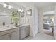 Modern bathroom with double sinks and a view of the bedroom at 3319 Belleville Ridge Rd, Elizabeth, CO 80107