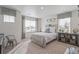 Cozy bedroom with window, a unique headboard, and a functional desk at 3319 Belleville Ridge Rd, Elizabeth, CO 80107