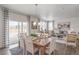 Dining room with wooden table and sliding glass doors at 3319 Belleville Ridge Rd, Elizabeth, CO 80107